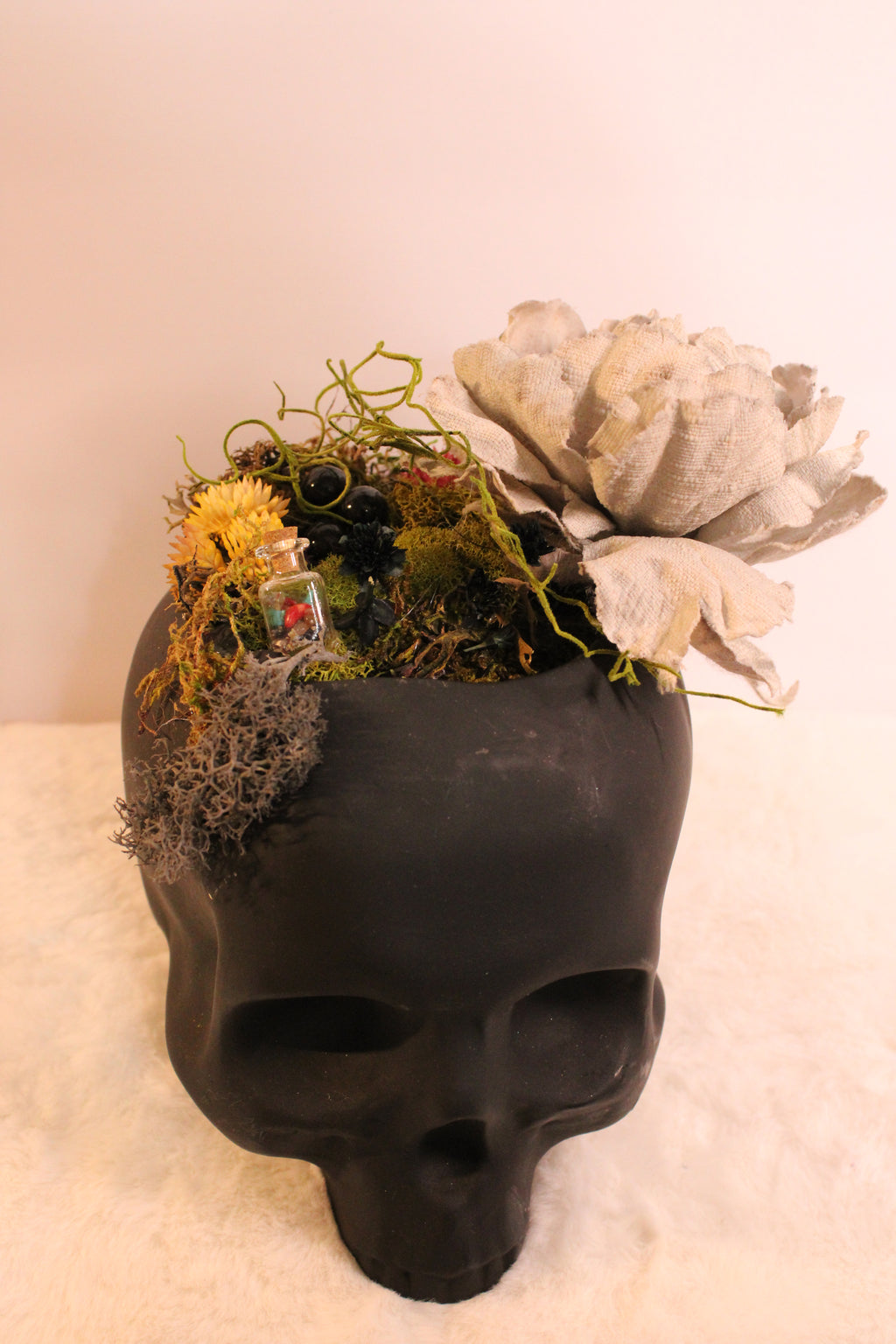 Matte Black Skull with Succulents, Moss, and Bleached Denim flower